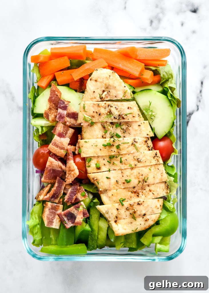 Chicken Bacon Ranch Salad Recipe: Creamy, Crunchy Weeknight Favorite 12 meal prepped go-to chicken bacon ranch salad in a glass container no dressing.