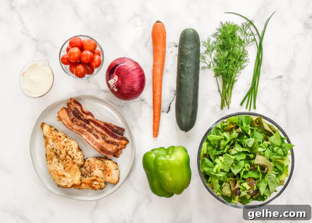 Chicken Bacon Ranch Salad Recipe: Creamy, Crunchy Weeknight Favorite 4 ingredients in a flat lay for the go-to chicken bacon ranch salad.