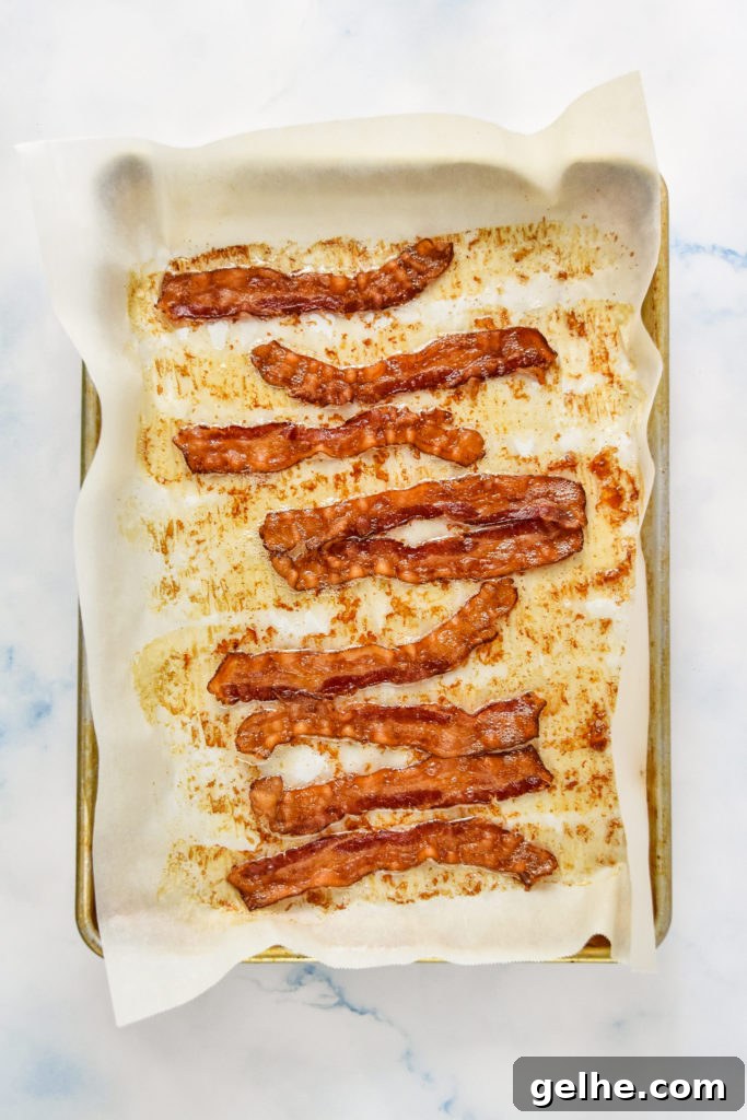 Chicken Bacon Ranch Salad Recipe: Creamy, Crunchy Weeknight Favorite 6 oven baked bacon on parchment paper.