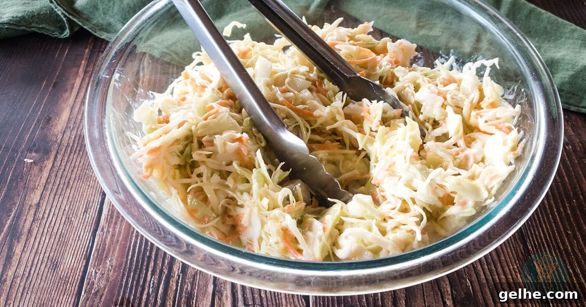 21 Labor Day Picnic Recipes for a Crowd: Ultimate Menu Ideas 13 A picture of Popeyes coleslaw copycat recipe in glass bowl.