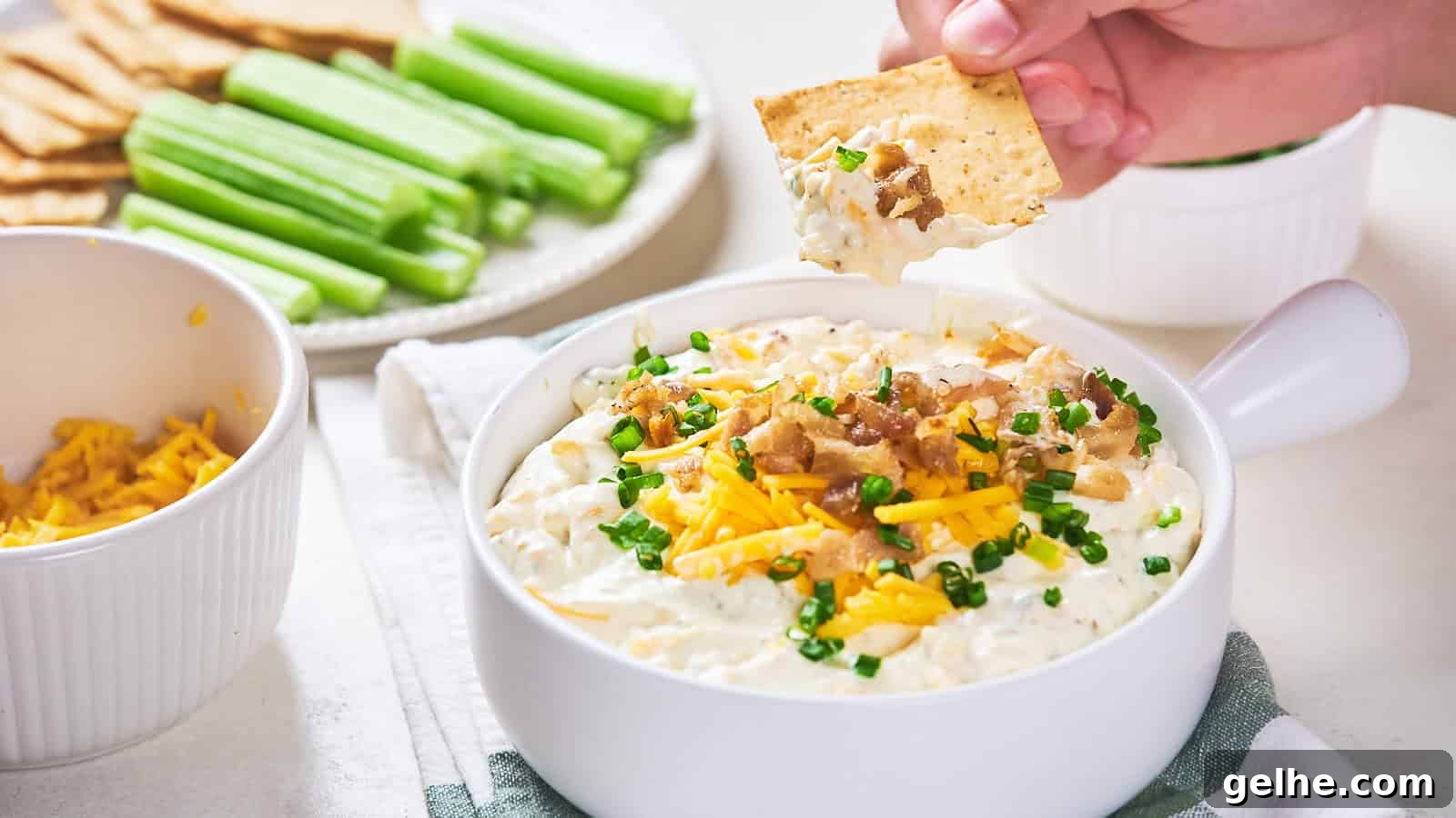 21 Labor Day Picnic Recipes for a Crowd: Ultimate Menu Ideas 19 Bacon cheddar dip with shredded cheddar cheese, bacon bits, and chive garnish.