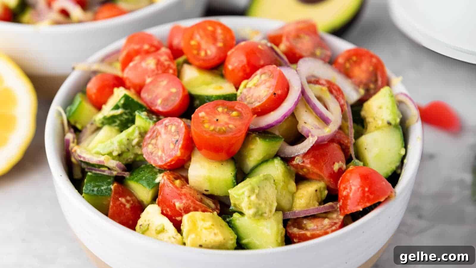 21 Labor Day Picnic Recipes for a Crowd: Ultimate Menu Ideas 22 A bowl of avocado salad, tossed with dressing.