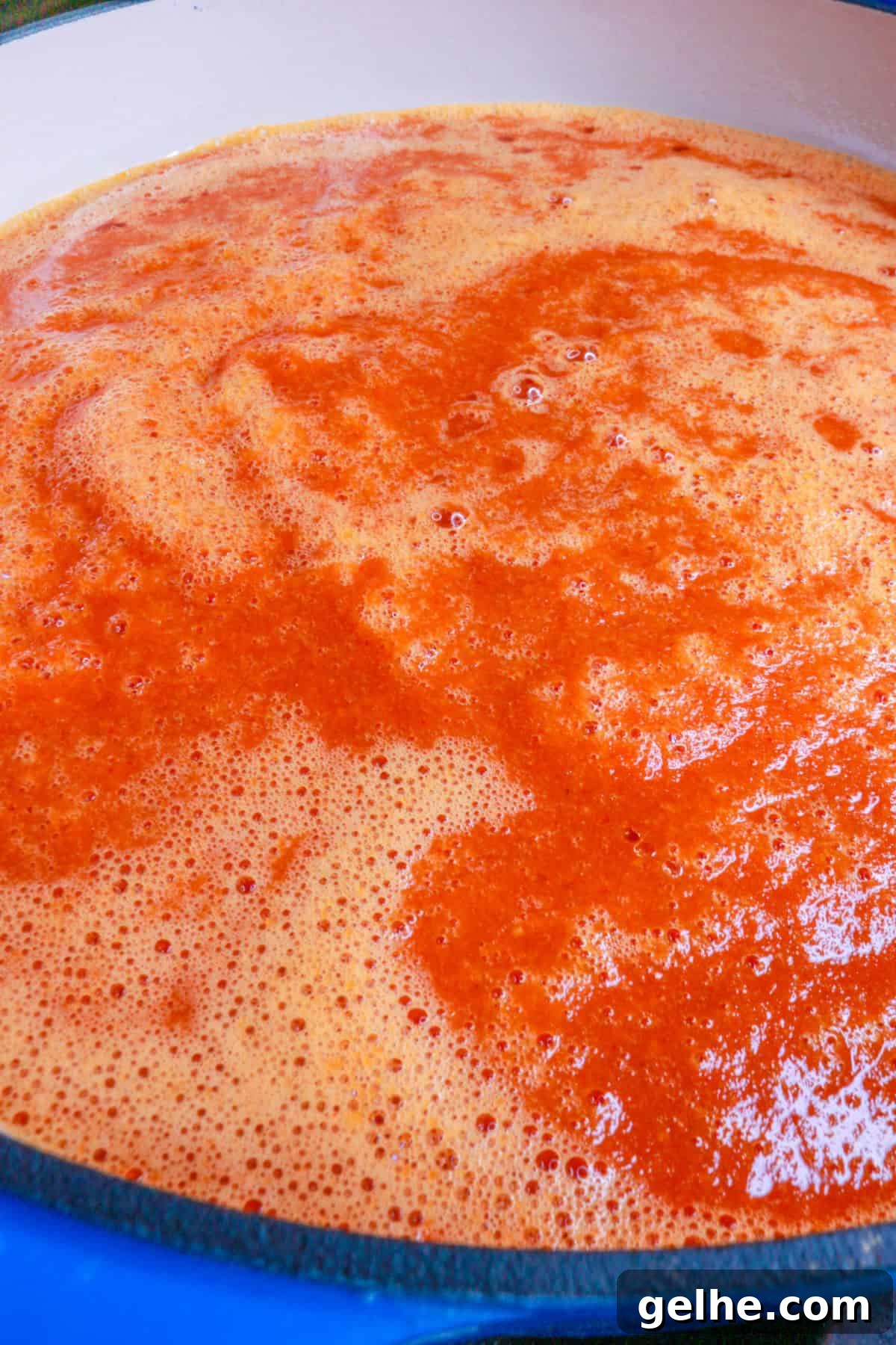 Sautéing chipotle sauce in a pot