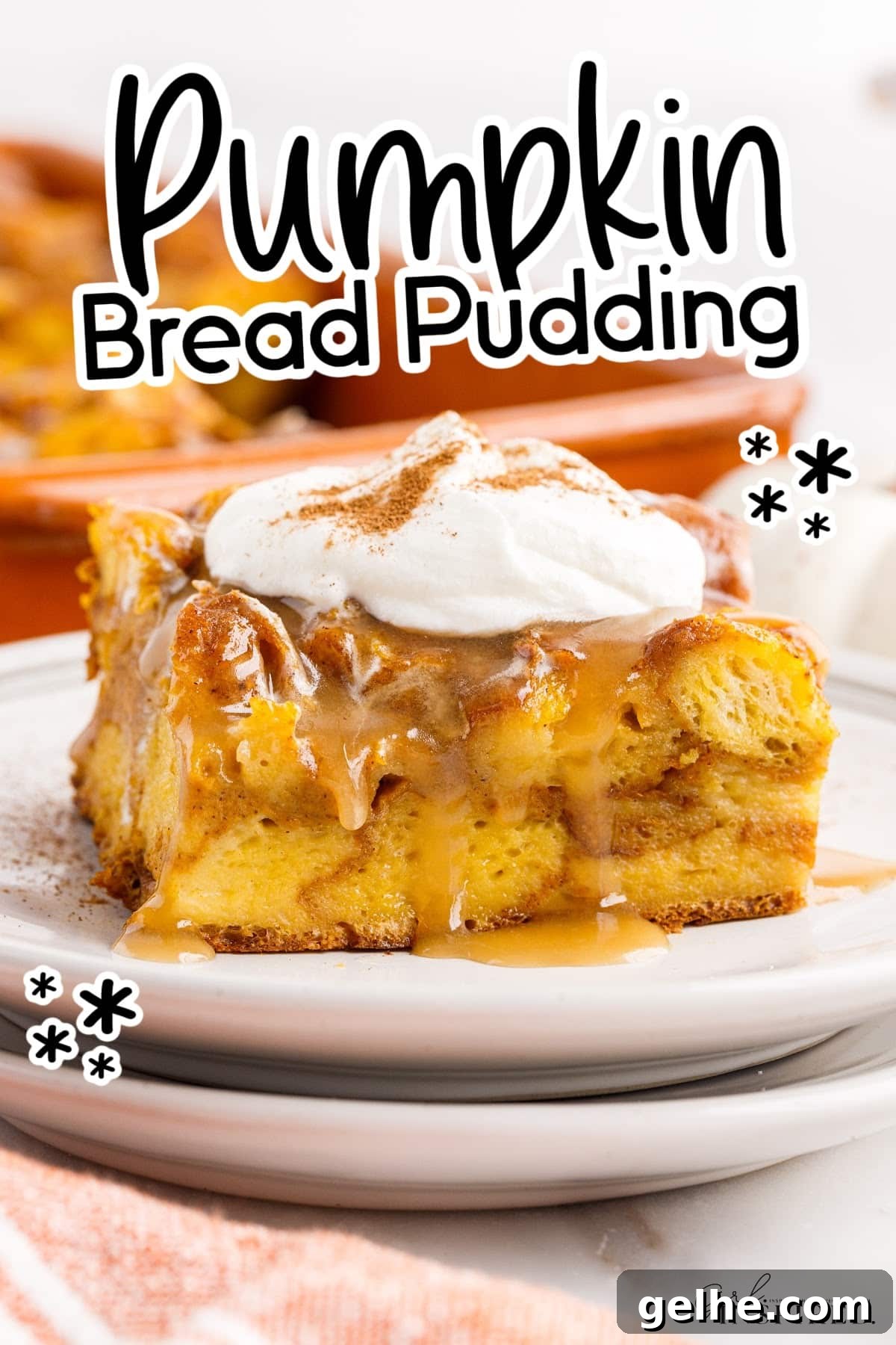 Slice of Pumpkin Bread Pudding on a plate with whipped cream on top and text overlay.