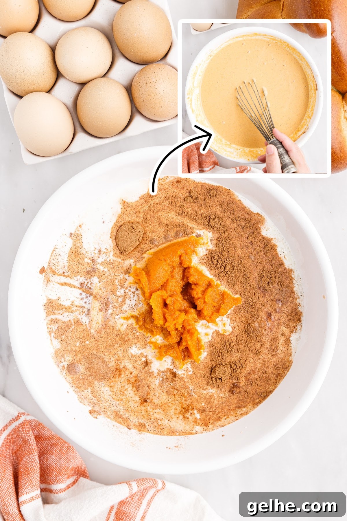 Spices and pumpkin being mixed in a bowl.