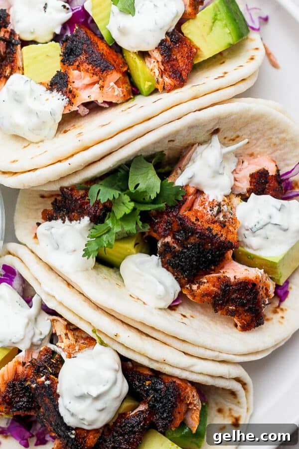 Savory Blackened Seasoning Blend for Fish, Chicken & Vegetables 7 Plate of three blackened salmon tacos.
