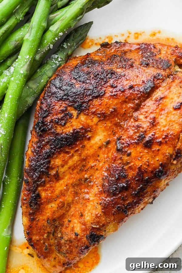 Savory Blackened Seasoning Blend for Fish, Chicken & Vegetables 9 Plate of blackened chicken with asparagus.