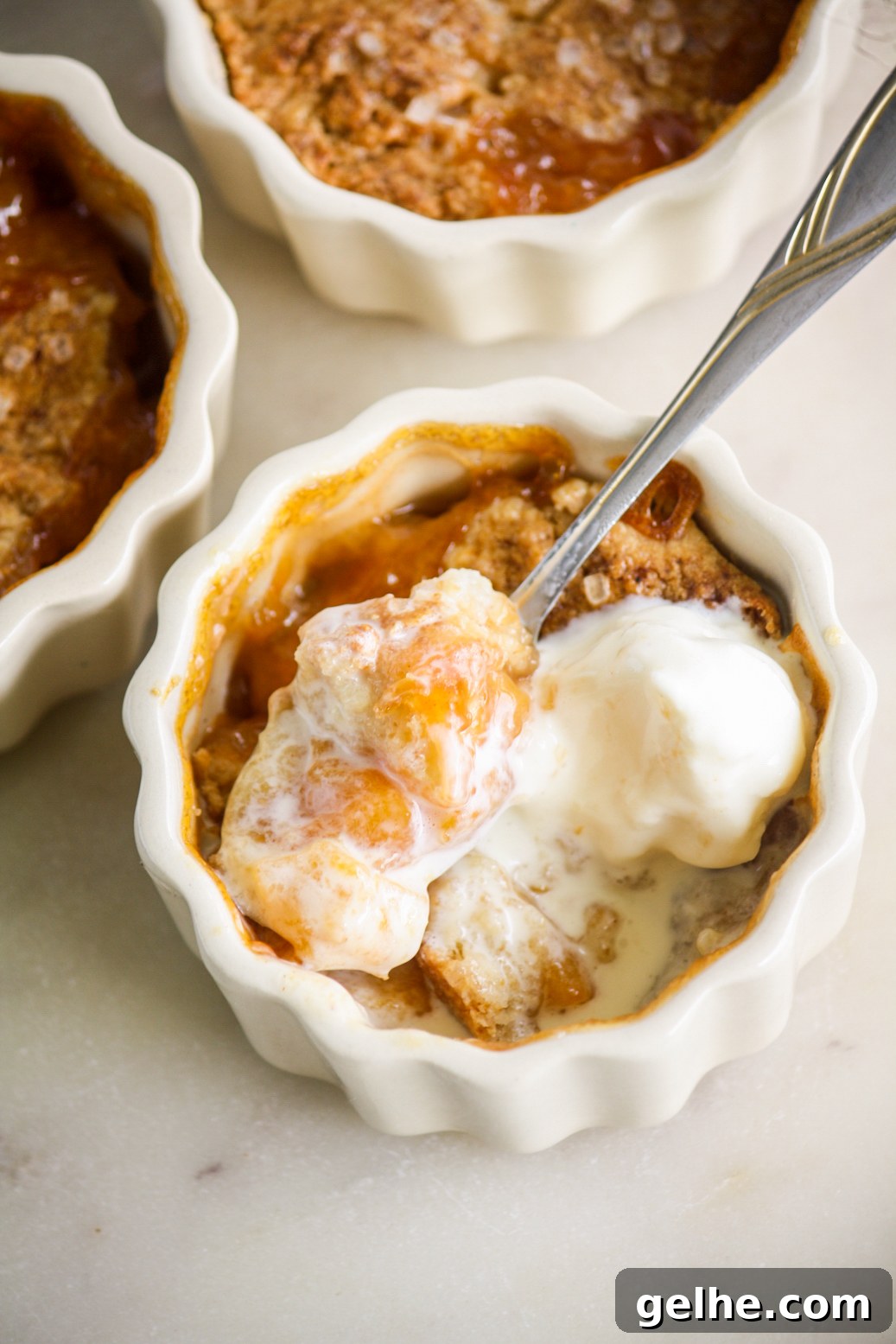 Mini Peach Cobbler Recipe: Quick Southern-Style Dessert 5 Individual cobblers with jammy peaches and a tender biscuity topping