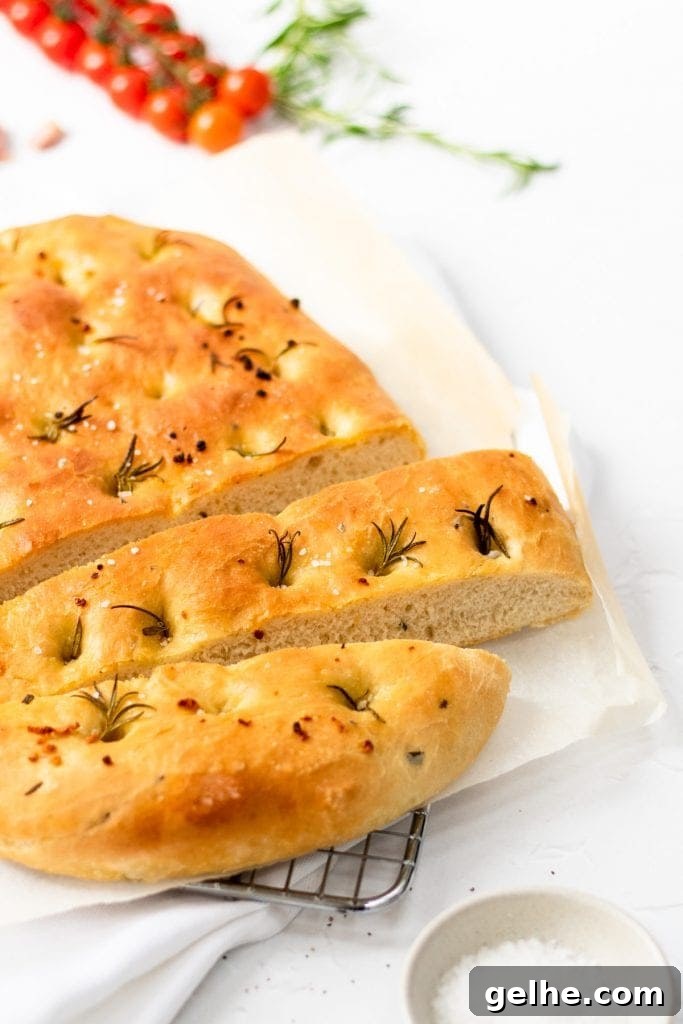 loaf of focaccia cut into a couple of slices