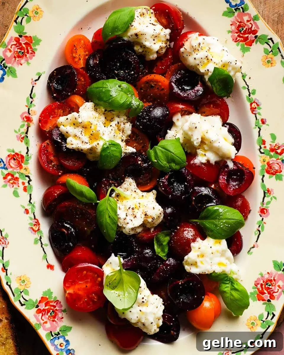 a platter of cherry caprese salad 