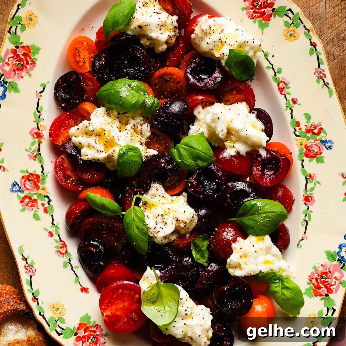 close up view of a platter of cherry caprese salad