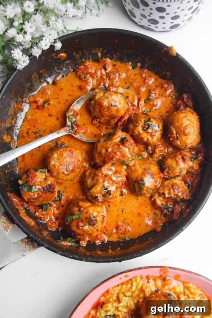 'Marry Me' chicken meatballs in sundried tomato sauce in a small pan.