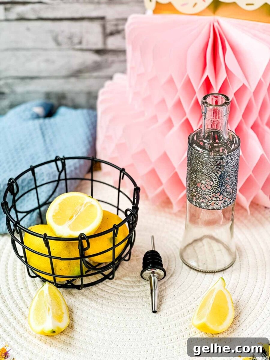 Fresh-Squeezed Lemon Juice: A Complete Guide to Making and Using It 4 Lemons in wire basket next to bottle and pouring spout.