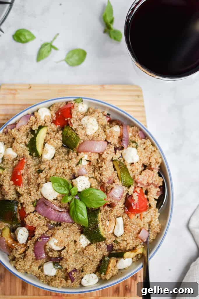Grilled Vegetable and Quinoa Salad with Lemon Vinaigrette 4 an overhead shot of the grilled vegetable quinoa salad with a glass of wine