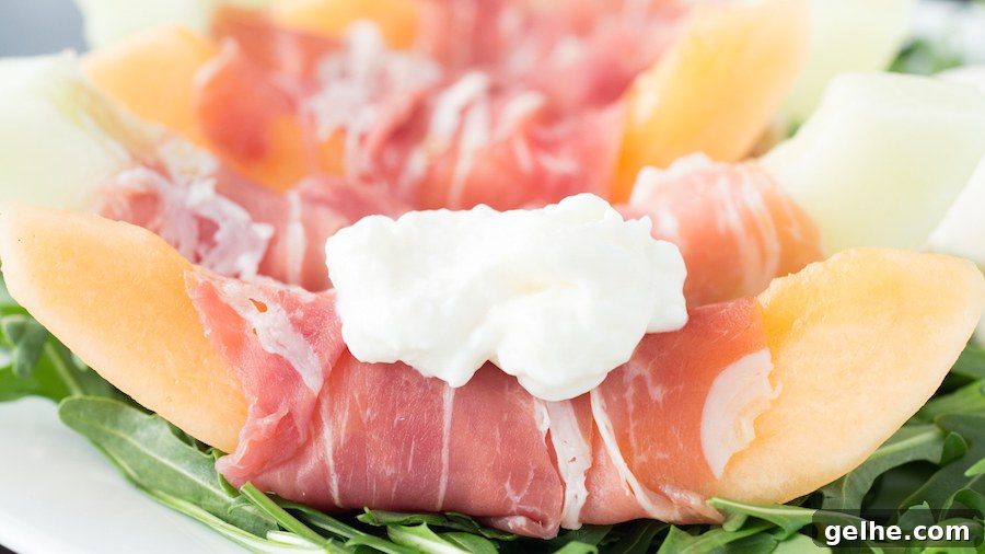 Prosciutto, Melon & Burrata Salad with Honey-Lemon Dressing 3 Cantaloupe & honeydew melon wrapped in prosciutto then topped with creamy burrata and served on a bed of arugula.