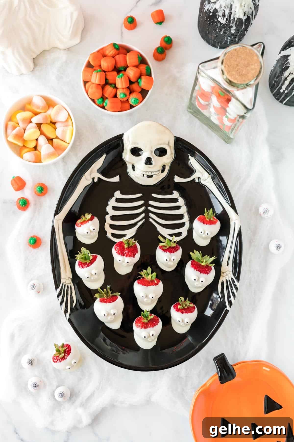 skeleton tray with strawberry ghosts on it