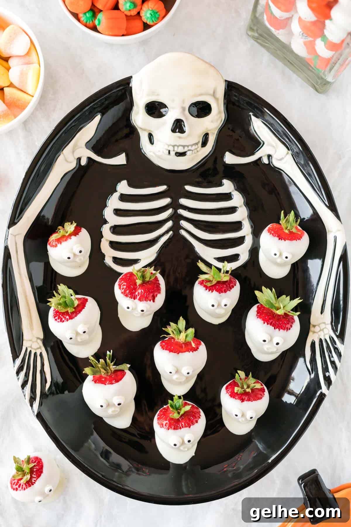 skeleton tray with strawberry ghosts on it
