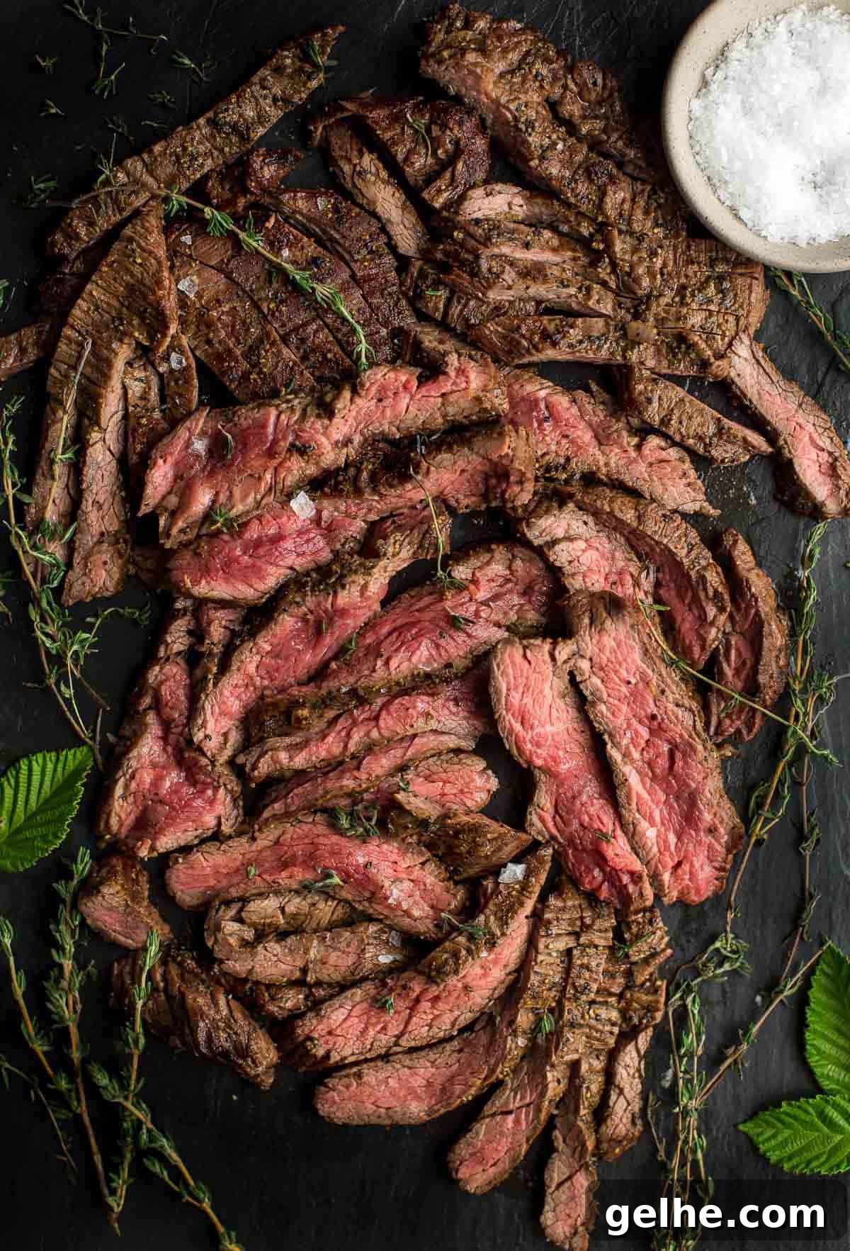 Beer Marinade Recipe for Grilled Bavette Steak 2 Grilled Bavette steak on a cutting board with a beer based Beef marinade.