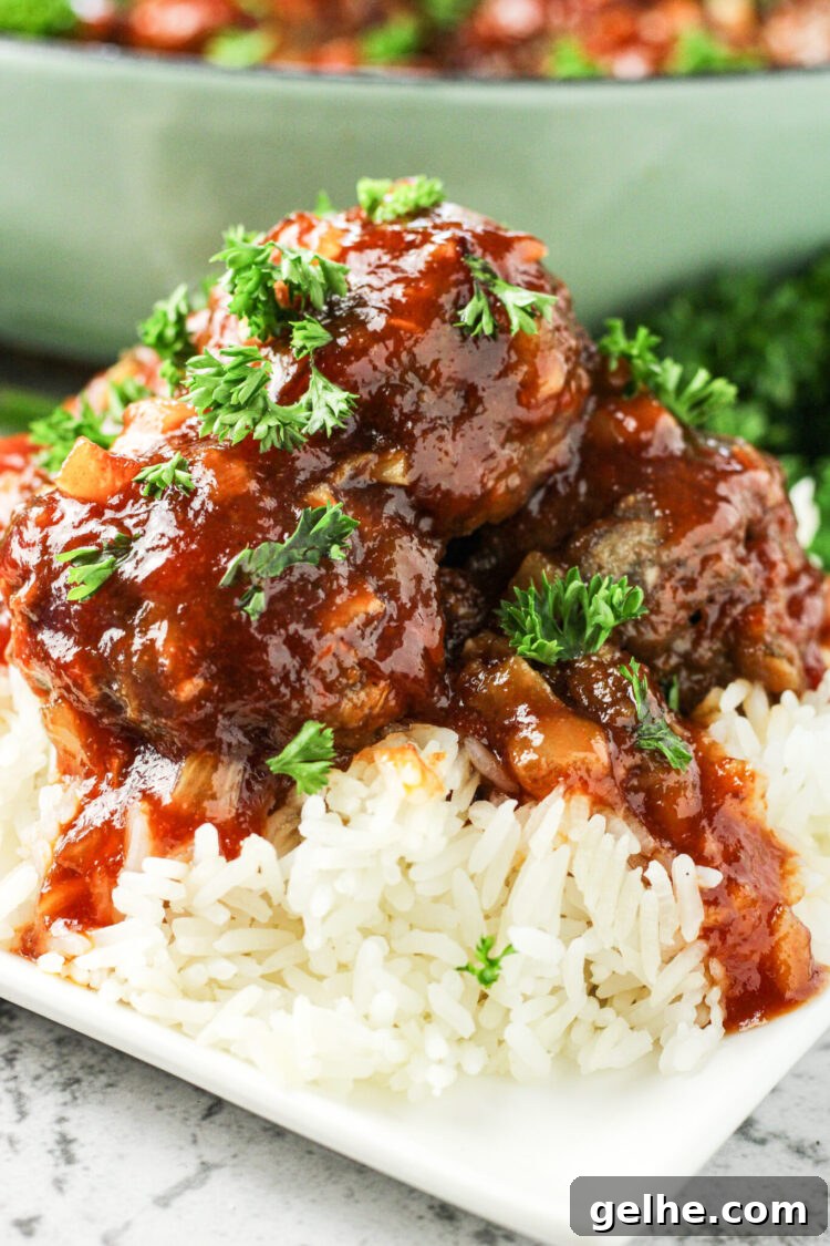 sweet and sour meatballs over rice