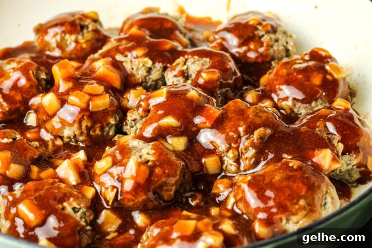 meatballs covered in sweet and sour sauce