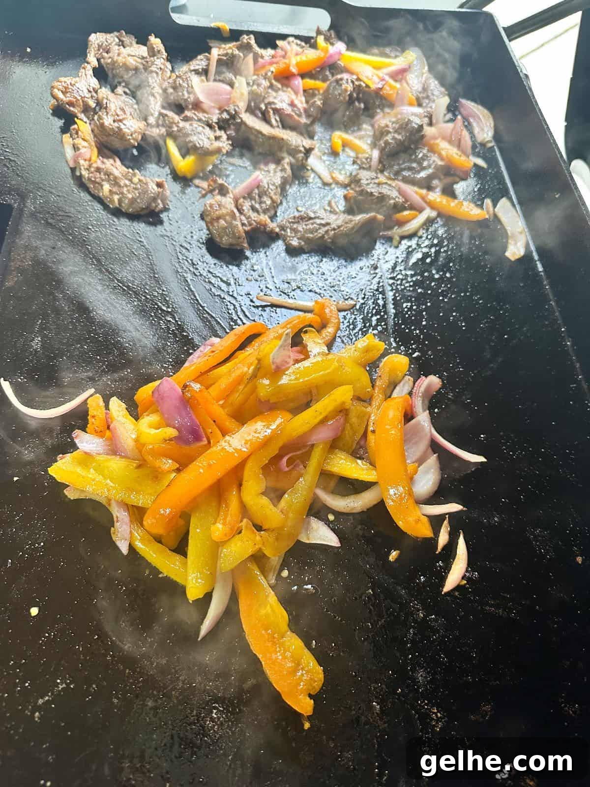 Flavor-Packed Skirt Steak Marinade for Juicy Fajitas 8 Fajita veggies being cooked