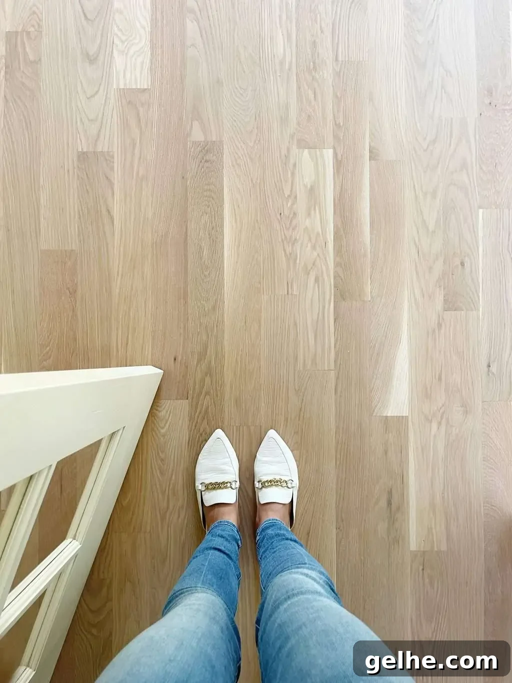 White Oak Flooring Guide: Types, Pros, Installation & Care 13 feet standing on white oak floors no stain