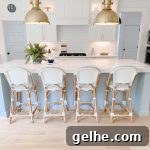 White Oak Flooring Guide: Types, Pros, Installation & Care 23 white subway tile in a kitchen