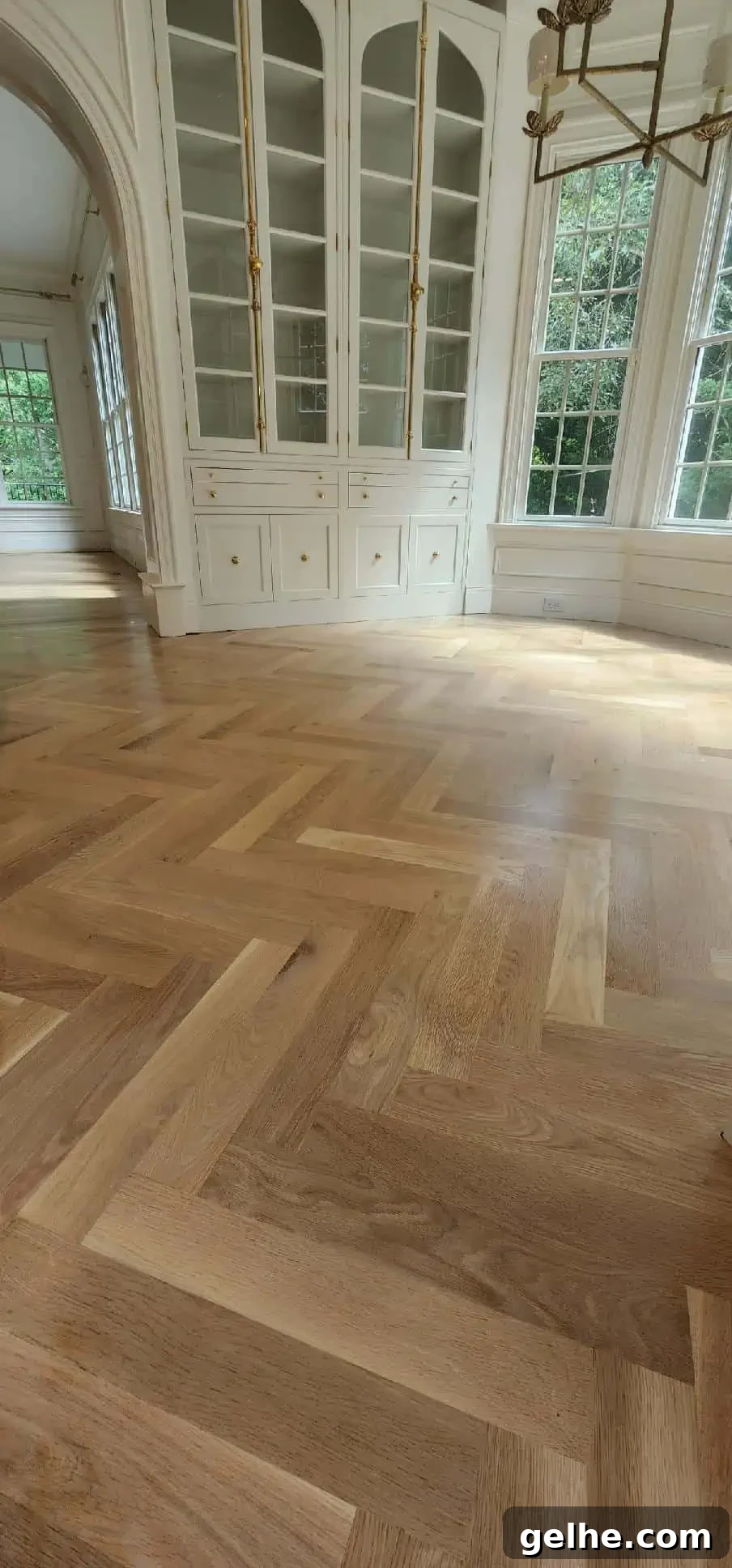 White Oak Flooring Guide: Types, Pros, Installation & Care 4 herringbone floor in kitchen