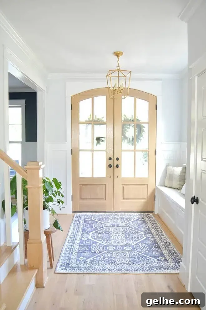 White Oak Flooring Guide: Types, Pros, Installation & Care 6 foyer with glass front doors and white oak hardwood flooring