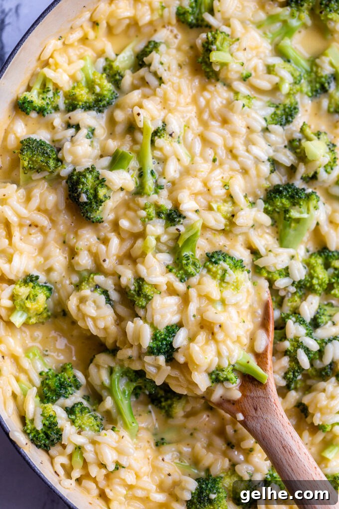 Stirring risotto with a wooden spoon.