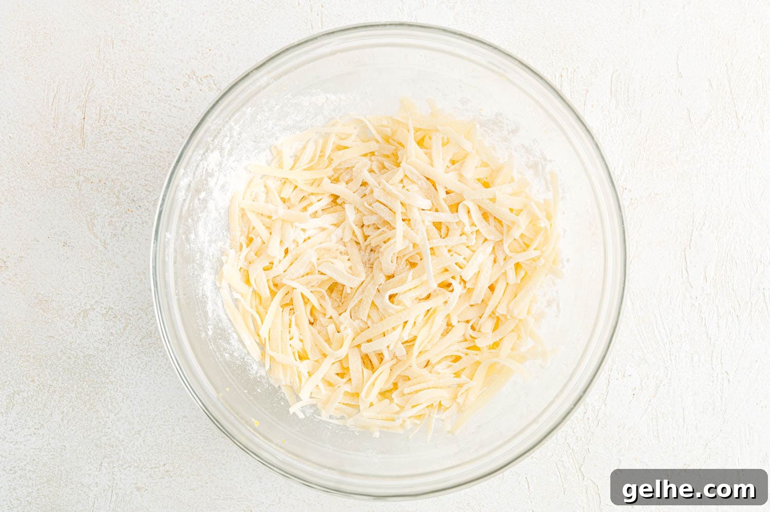 Cheese tossed with flour.