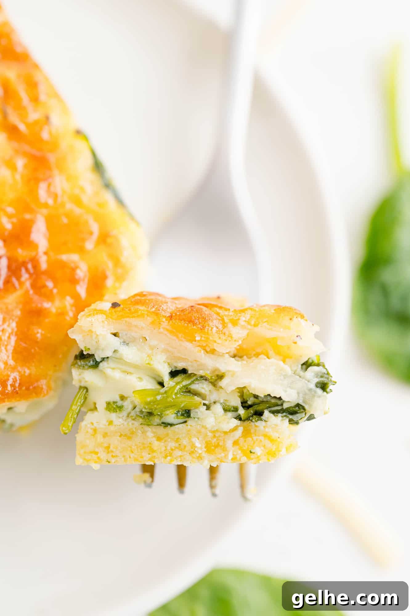 Quiche on a fork.