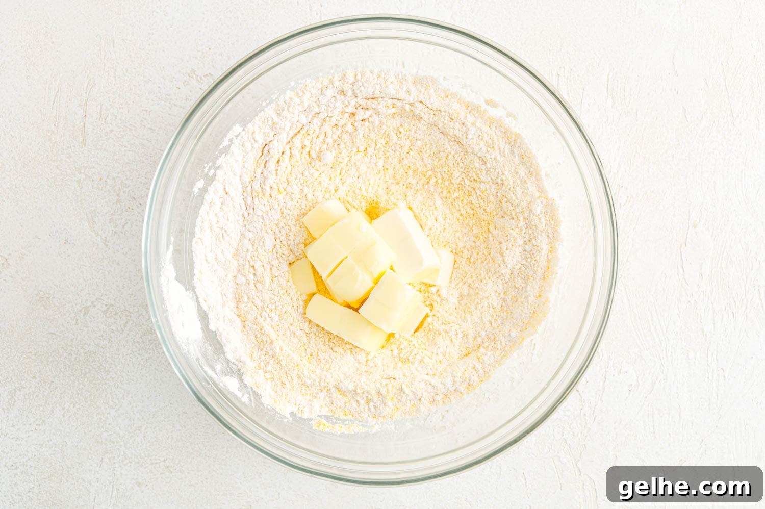 Butter added to dry ingredients.