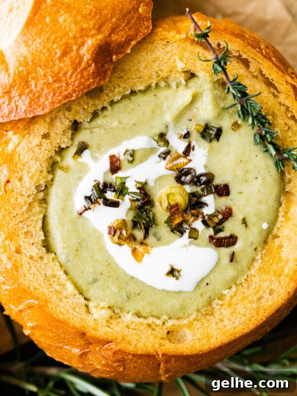 Creamy cauliflower leek soup in a bread bowl.