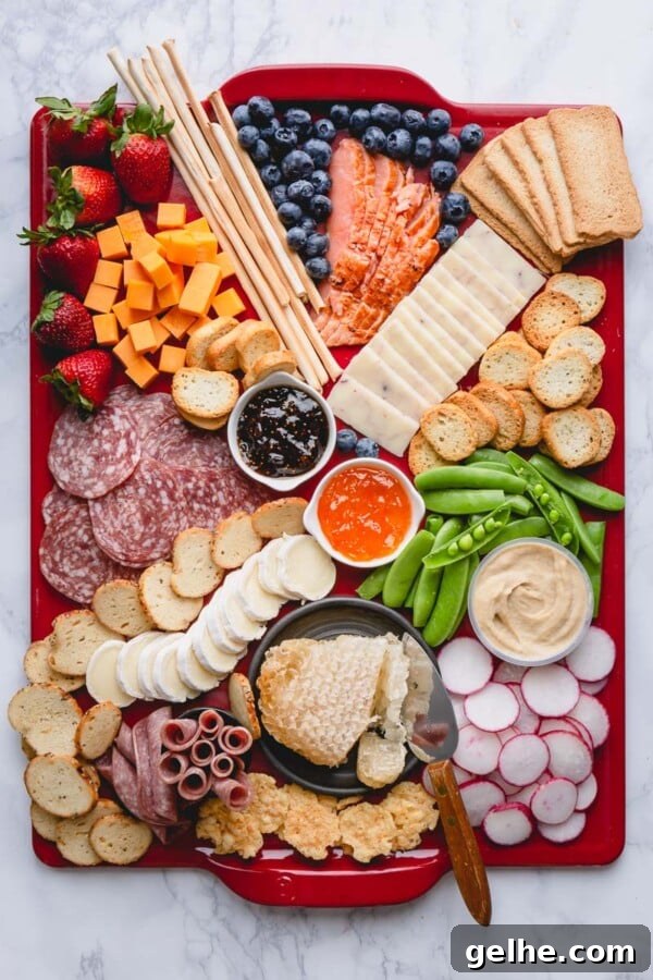 Ultimate Charcuterie Board Ideas for Entertaining Guests 4 Cheeses on board