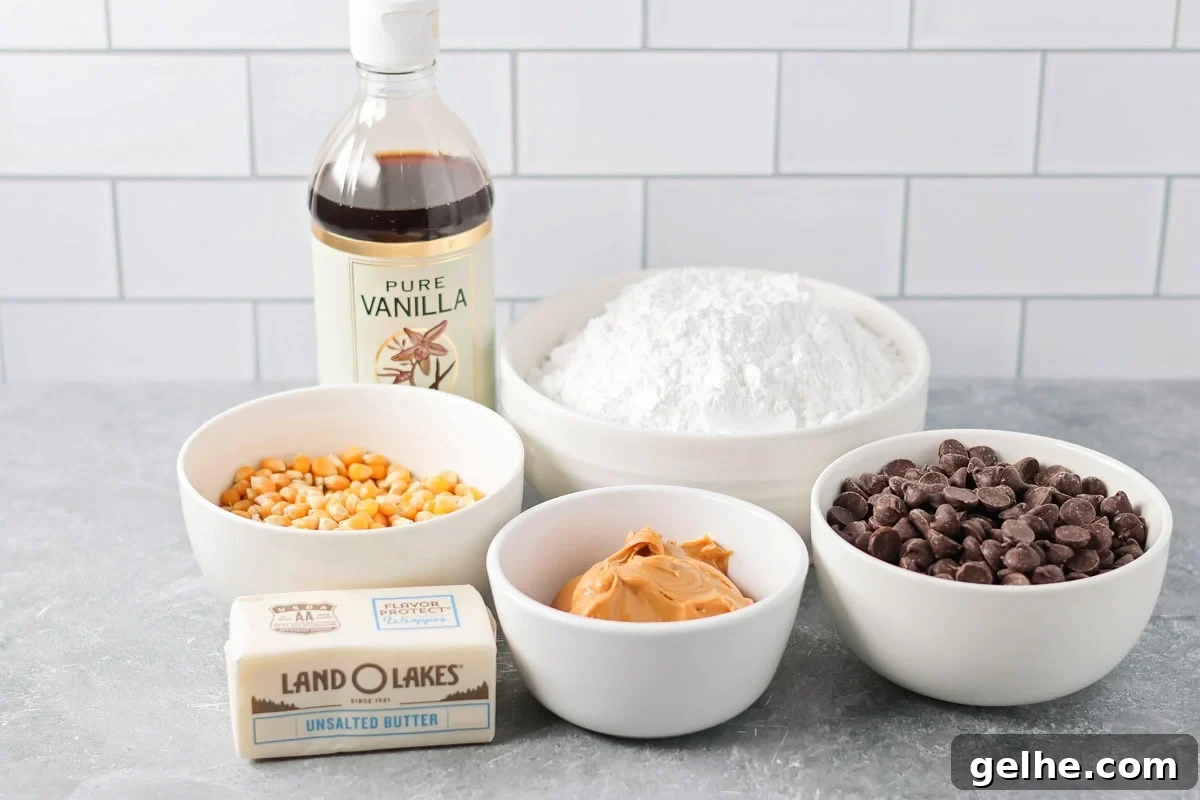 Puppy Chow Popcorn is an irresistible sweet and salty snack that's easy to make and guaranteed to be a hit. Ingredients to make puppy chow popcorn on a kitchen counter.