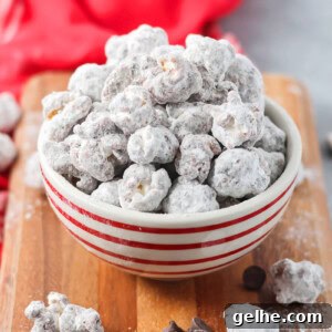 Puppy Chow Popcorn Recipe: Sweet, Crunchy Party Snack 3 Puppy chow popcorn in a small bowl.