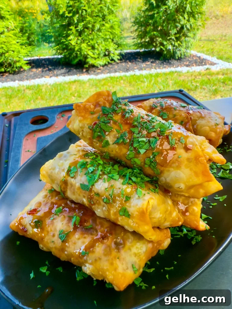 texas twinkie egg rolls on a black plate