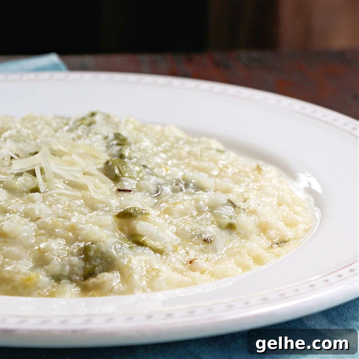 17 Delicious Vegetarian Easter Dinner Ideas for a Memorable Feast 14 A plate of creamy risotto with asparagus, cooked in the slow cooker.