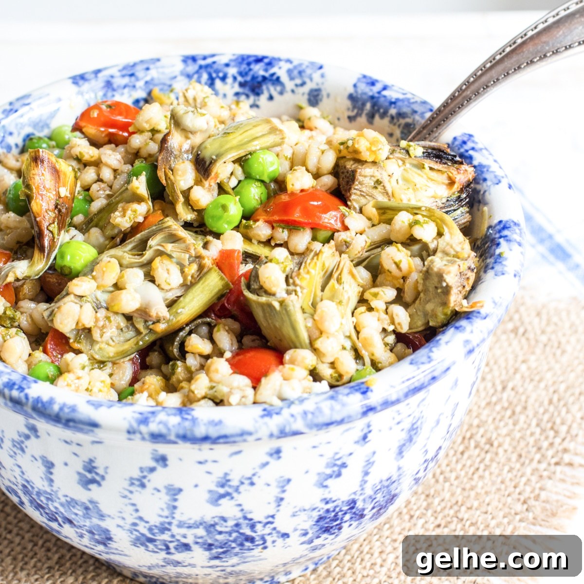 17 Delicious Vegetarian Easter Dinner Ideas for a Memorable Feast 17 A bowl of warm barley pilaf tossed with artichoke hearts, tomatoes, peas, and finished with a vinaigrette.