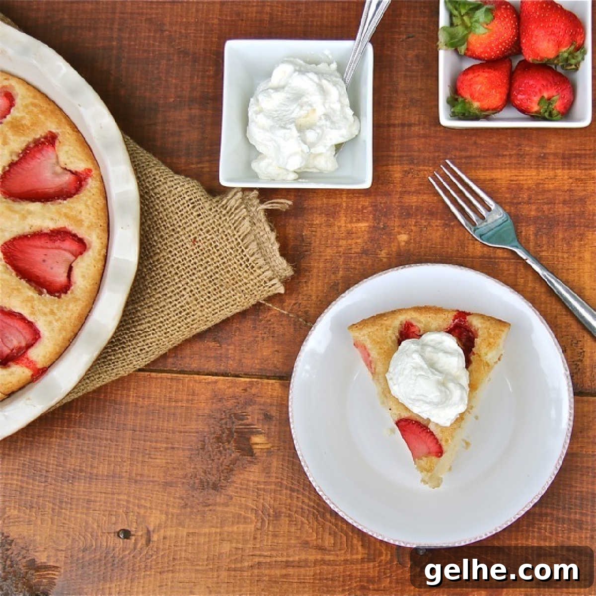 17 Delicious Vegetarian Easter Dinner Ideas for a Memorable Feast 19 A piece of strawberry cake topped with whipped cream, and small dishes or strawberries and whipped cream.