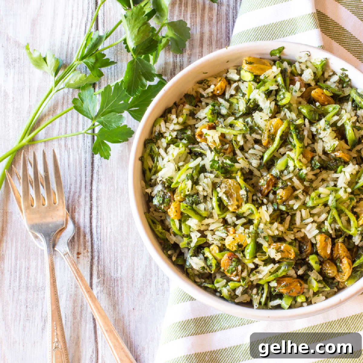 17 Delicious Vegetarian Easter Dinner Ideas for a Memorable Feast 9 A bowl of cooked rice tossed with fresh herbs, scallions and raisins.