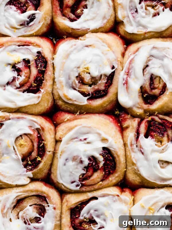 The baked, iced sweet rolls with jammy raspberry filling.