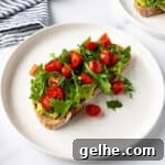 Tomato Avocado Toast with Arugula