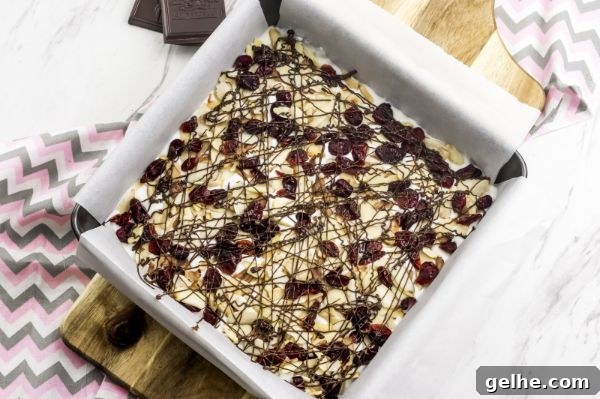Toasted Almond Cranberry Bark Recipe with Step-by-Step Photos 4 WW Toasted Almond Bark recipe put together in an 8 x 8 inch pan ready for the freezer