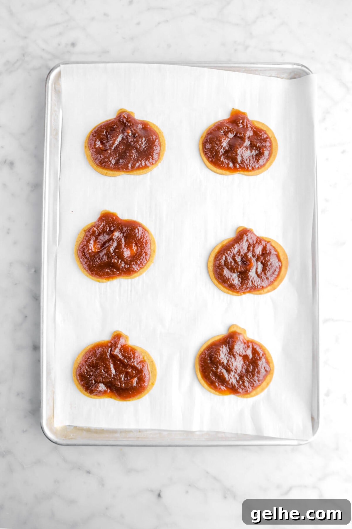pumpkin butter spread across each cookie.