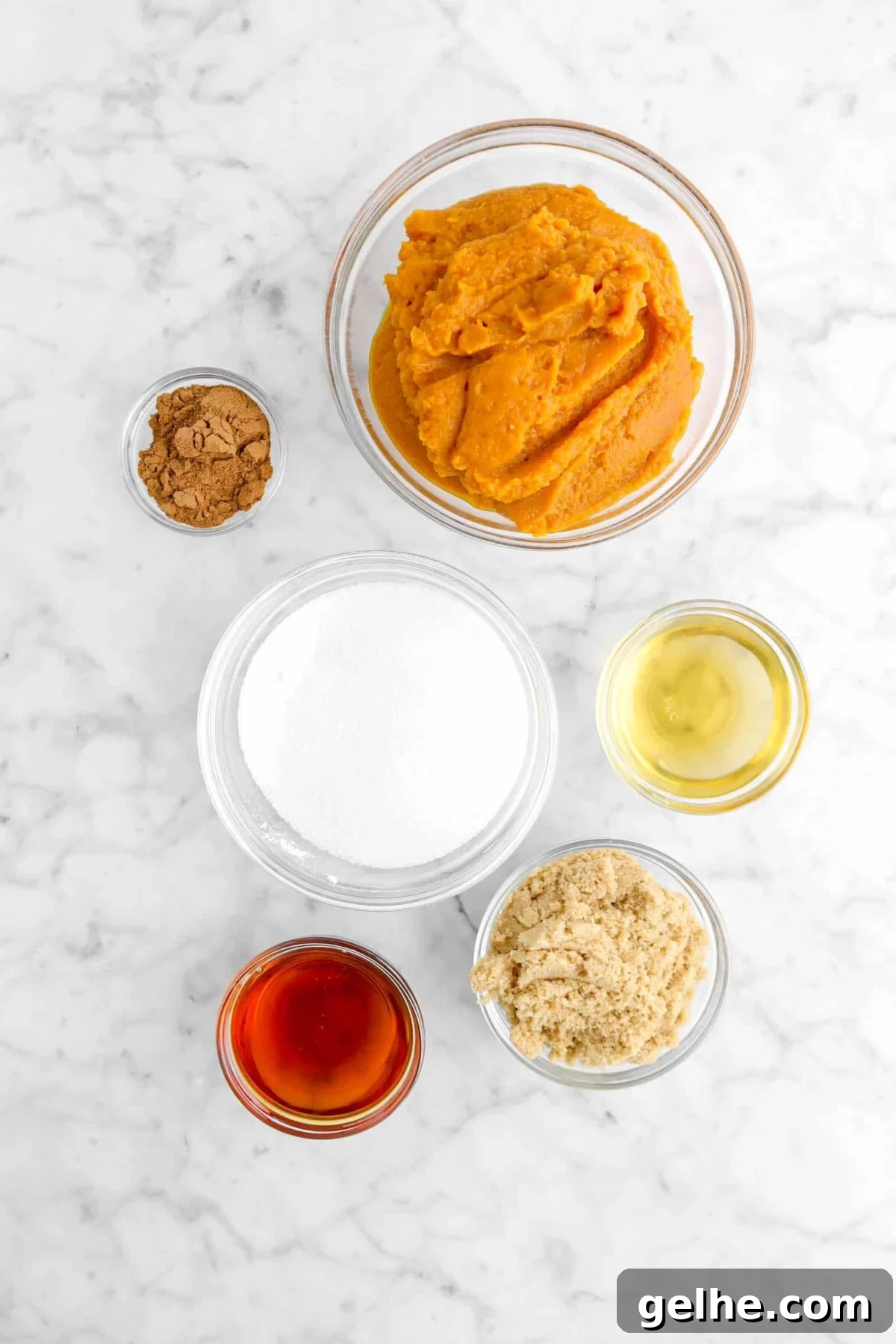 pumpkin, spice, apple cider, sugar, brown sugar, and boiled cider in glass bowls