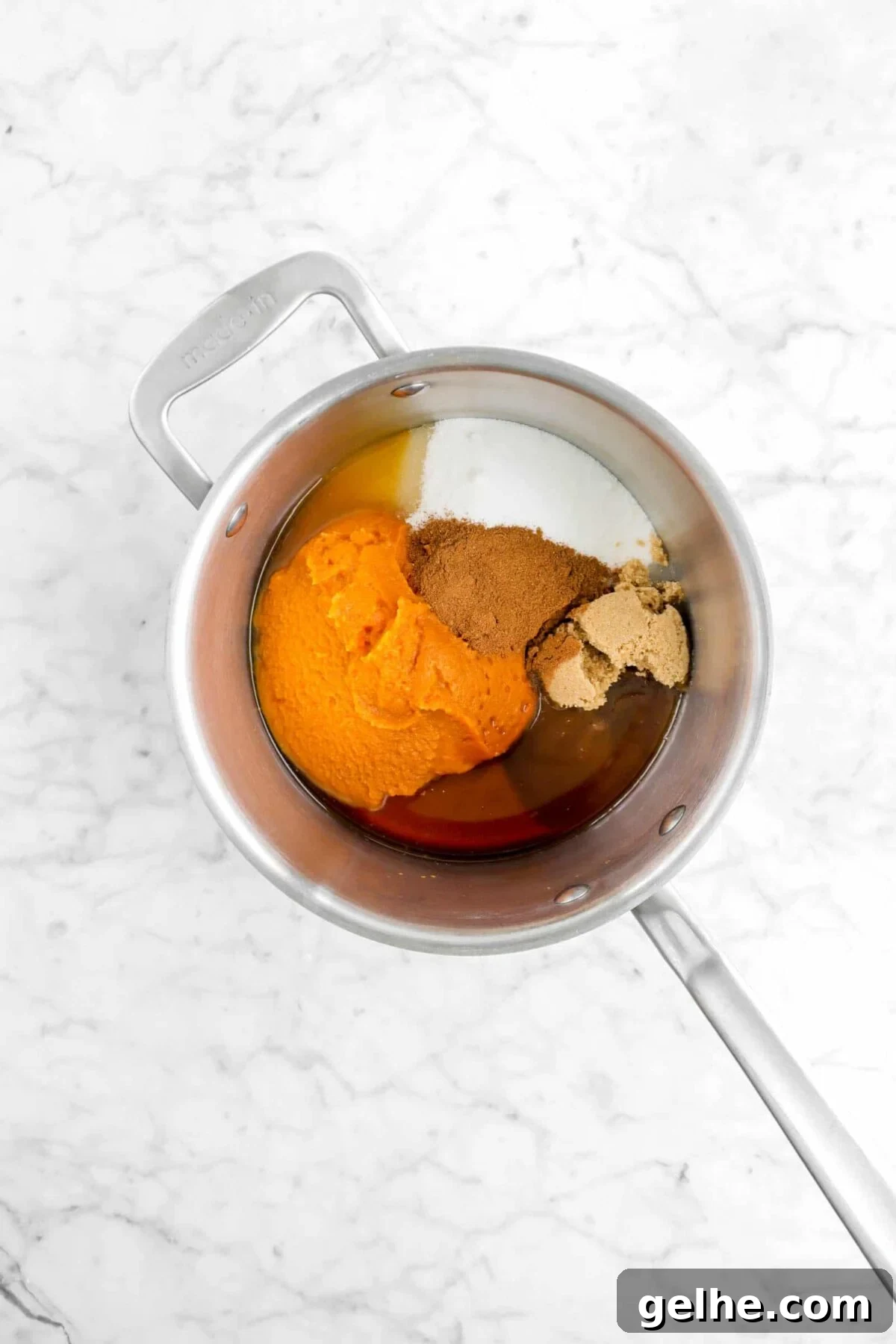 pumpkin, apple cider, sugar, brown sugar, and vanilla in a pot