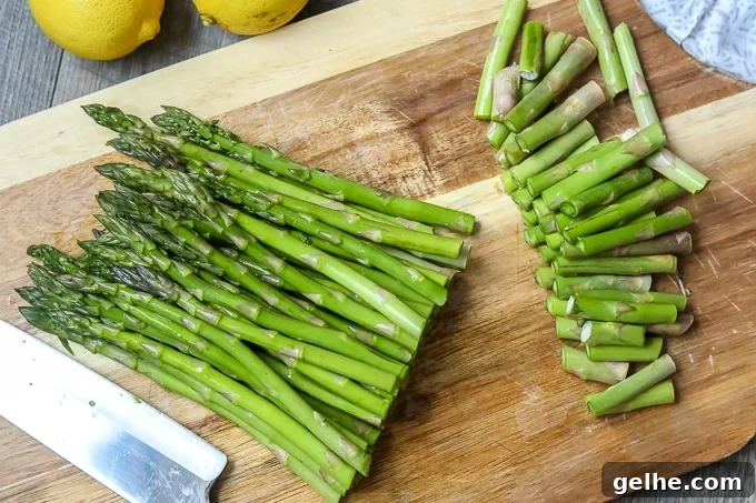 Trimmed Asparagus on cutting board.