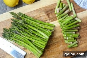 Trimmed Asparagus on cutting board.
